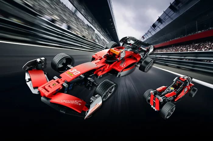 Red F1 racing car build speeding along a blurred racetrack